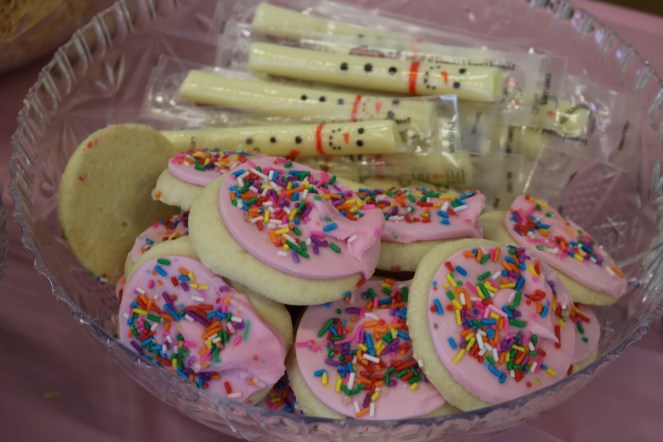 Snowmen cheese string and frosted cookies